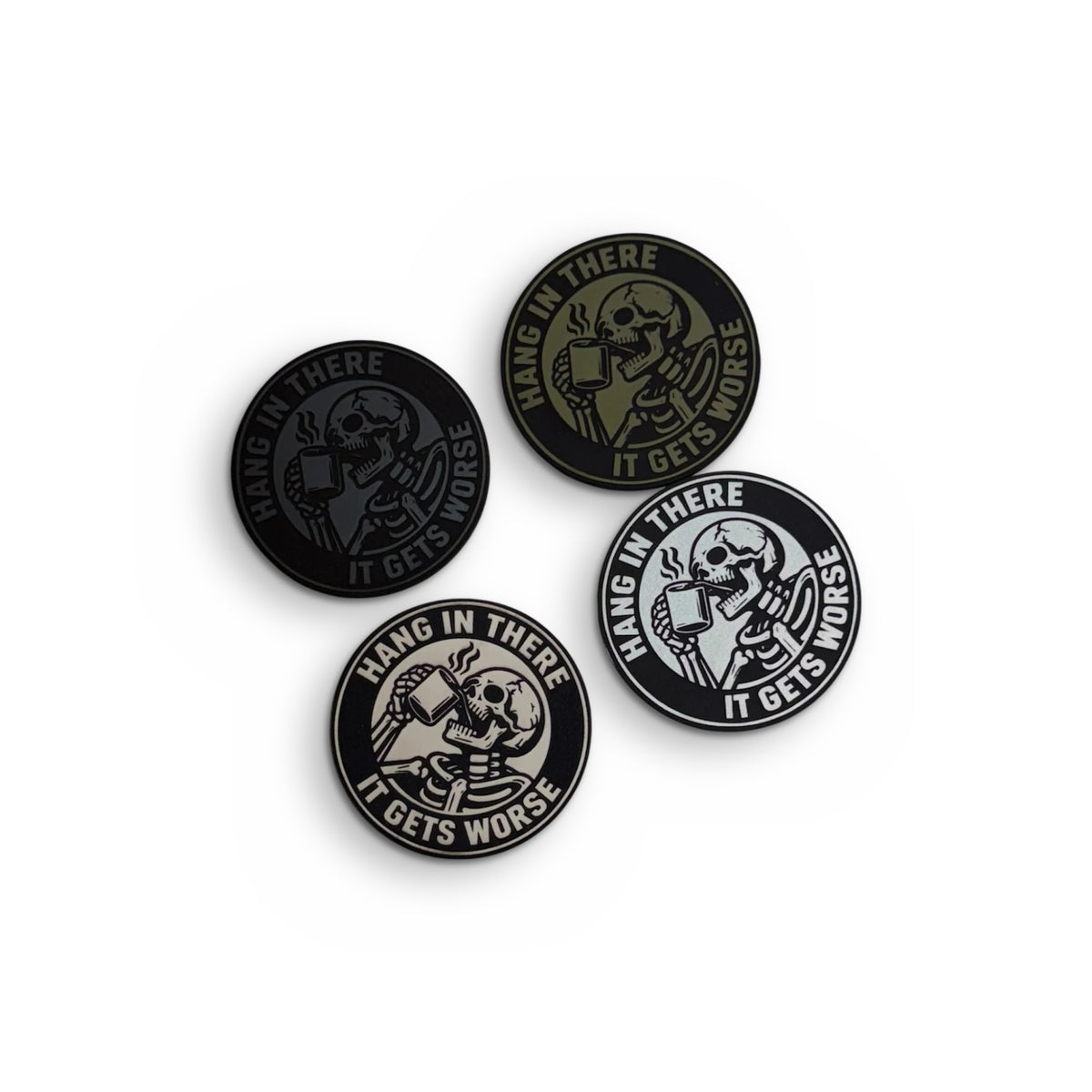 Holdover patches in Dark Grey, Moss, Rawhide and White